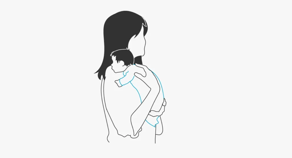 Tenez votre bébé par l'épaule