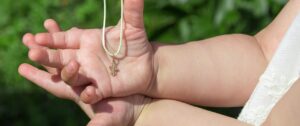 La médaille de baptême décodée